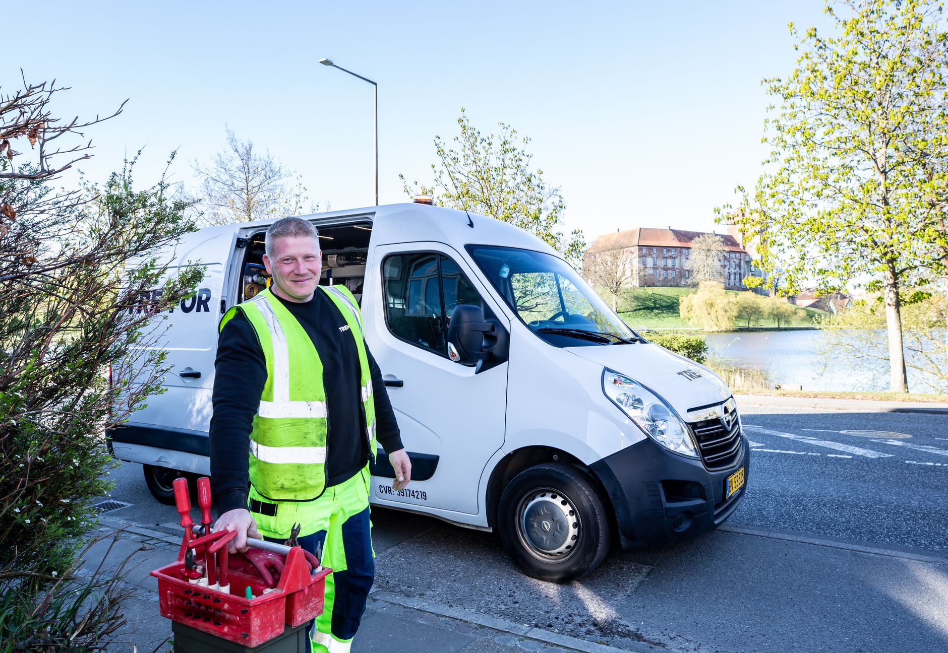 Field service technician at a work van