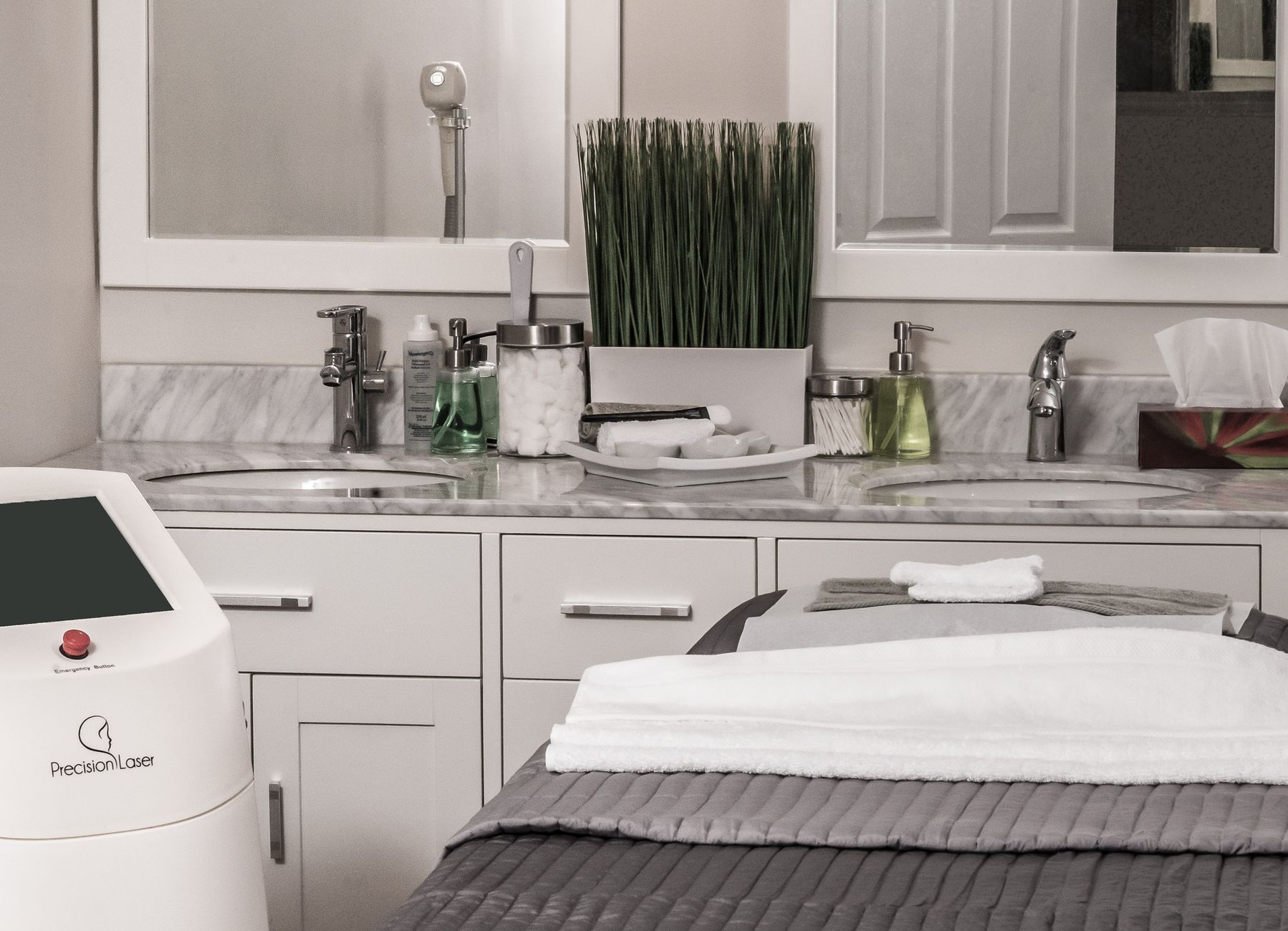 Modern med spa treatment room with aesthetic equipment