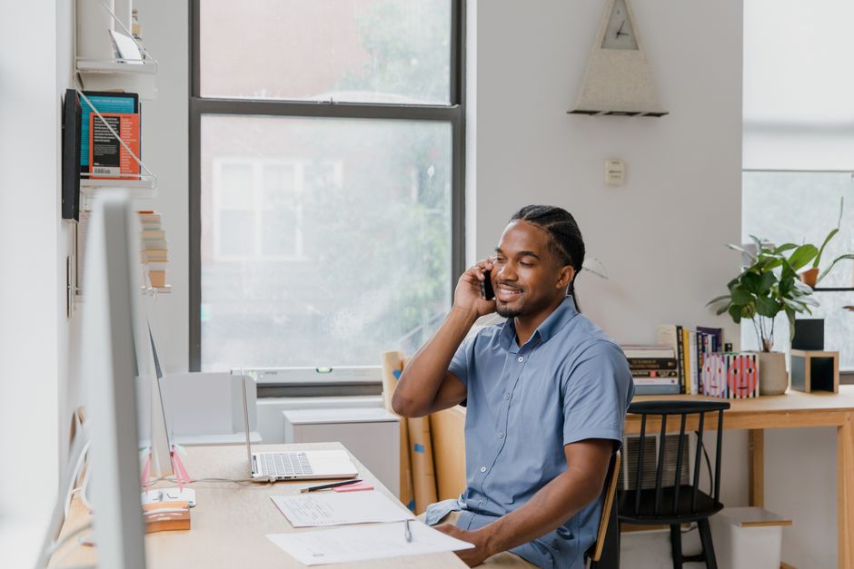 A business owner working at an office desk
